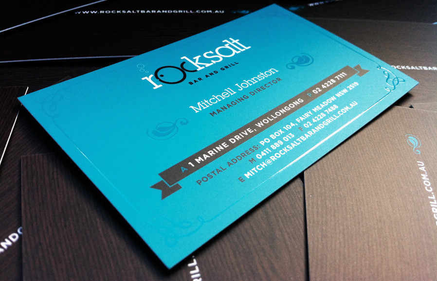 Business cards, showing the spot-UV treatment on the border